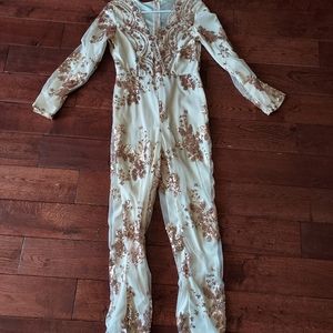 Cream silk  jumpsuit wuth decorative gold sequins